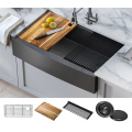 matte black apron front ktchen sink with workstation